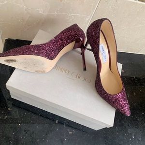 Jimmy Choo coarse glitter pumps.